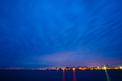 Scenic view of sea against sky at night