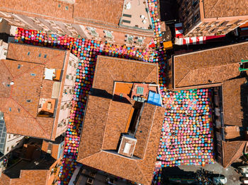 Catania sicily italy 2022 street art decoration using umbrellas at the fish market