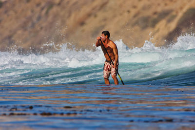 Full length of man on beach