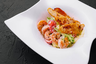 High angle view of food in plate on table