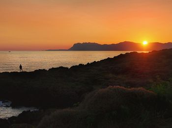 Scenic view of sunset over sea