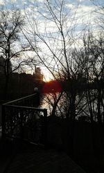 Scenic view of river at sunset