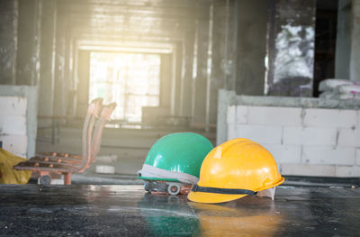 Yellow toy on table at construction site