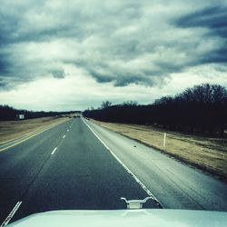 View of road against cloudy sky