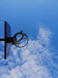 Low angle view of basketball hoop against sky