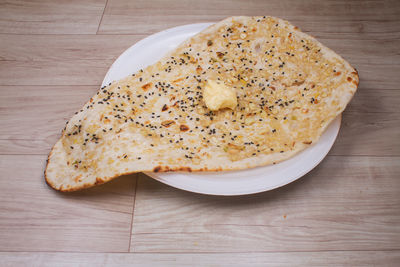 High angle view of bread in plate on table