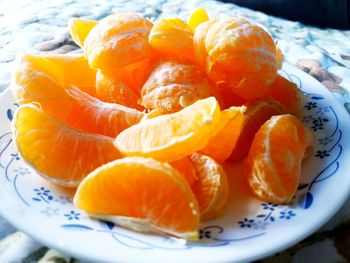 Close-up of orange slices in plate