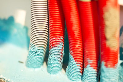 Close-up of multi colored pencils in row