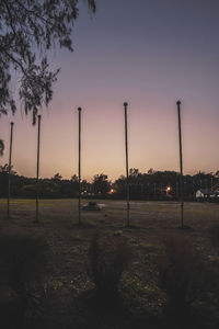 Scenic view of field against sky during sunset