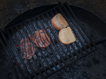 High angle view of food on barbecue grill