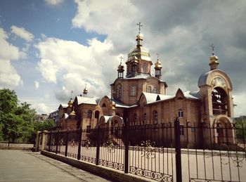 View of cathedral against cloudy sky