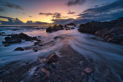 Scenic view of sea against sky during sunset