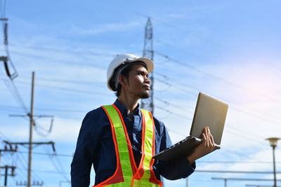 Mid adult man looking at camera