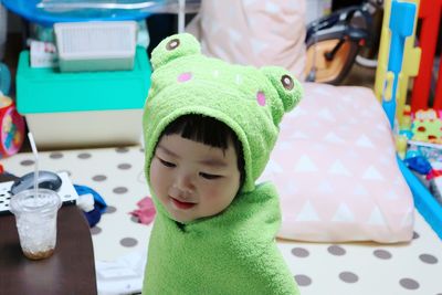 Close-up of cute baby playing with toy