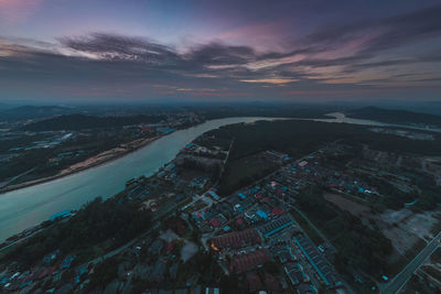 High angle view of townscape against sky at sunset