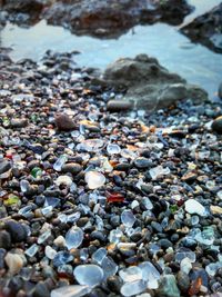 High angle view of pebbles on beach