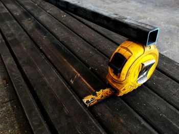 High angle view of old tape measure on table