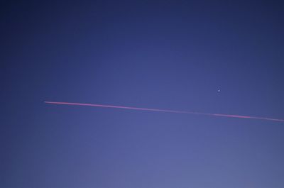 Vapor trail in blue sky