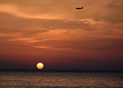 Scenic view of sea at sunset