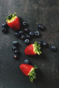 High angle view of strawberries on table