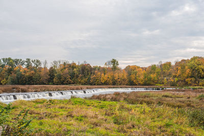 Scenic view of landscape against sky during autumn