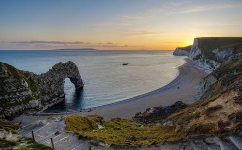 Scenic view of sea against sky during sunset