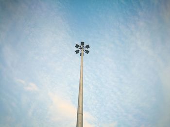 Low angle view of floodlight against sky