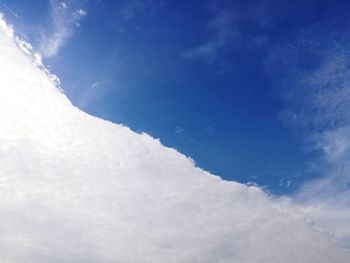 Low angle view of clouds in blue sky