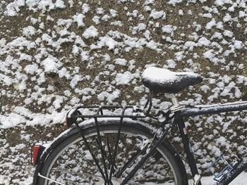 Close-up of bicycle wheel during winter