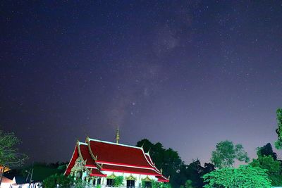 Low angle view of building against sky at night