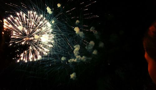 Firework display at night