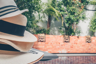 Rear view of man wearing hat on table