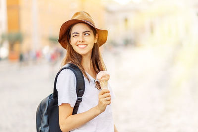 Young woman wearing hat