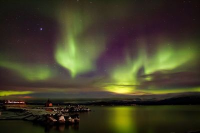 Scenic view of sea against sky at night