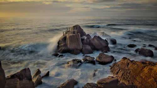 Scenic view of sea against sky during sunset