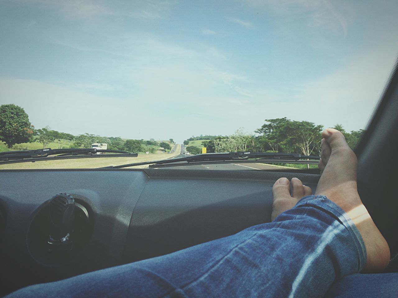 personal perspective, transportation, low section, lifestyles, person, mode of transport, men, leisure activity, land vehicle, vehicle interior, car, part of, travel, tree, cropped, car interior, sitting