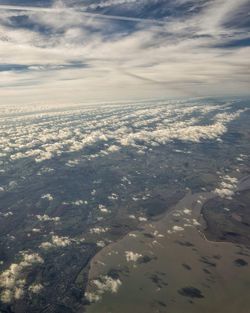 Aerial view of landscape against sky during sunset