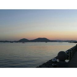 Scenic view of sea at sunset