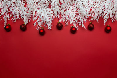 Different christmas decorations on the red background. high quality photo