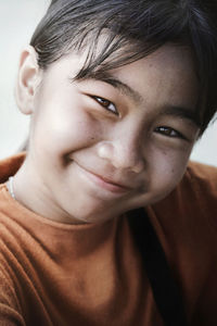 Close-up portrait of smiling woman