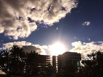 Low angle view of building against cloudy sky