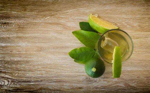 Directly above shot of green fruits on table