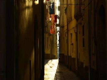 Narrow alley along buildings