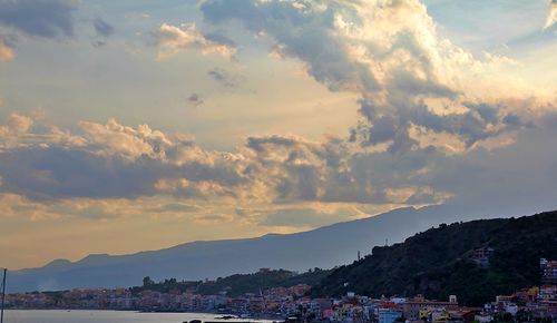 Panoramic view of townscape against sky during sunset