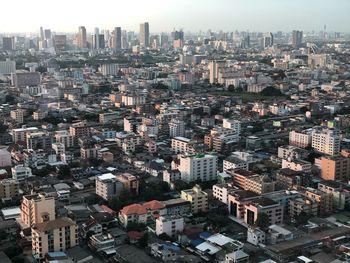 High angle view of buildings in city against sky