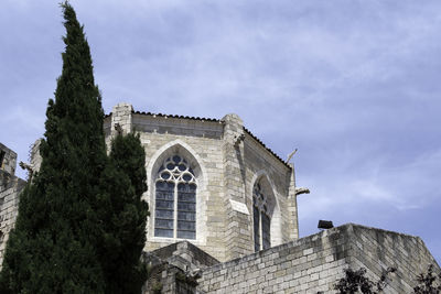 Low angle view of historic building against sky