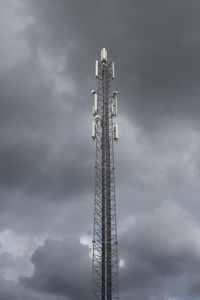 Telecommunication mast for signals for telephone with a clouded threatening sky