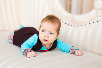 Portrait of cute baby girl at home