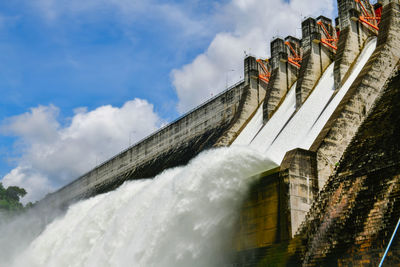 Low angle view of dam against sky