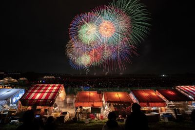 Firework display at night
